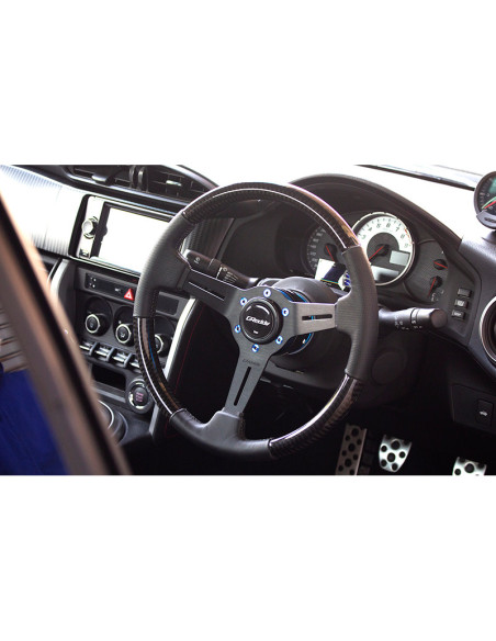 Volante GReddy Sports "Real Carbon" (calandratura da 47 mm), razze nere - 340 mm